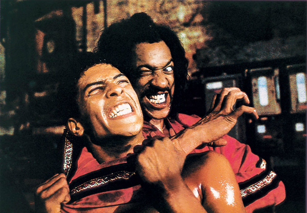 Sho'nuff (Julius Carry) gets 'Bruce' Leroy Green (Taimak) into a headlock in this production still from Berry Gordy's The Last Dragon (1985).